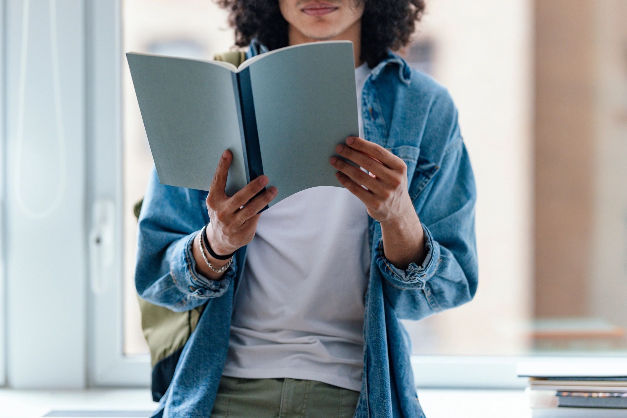 Student reading a book to represent speed reading skills